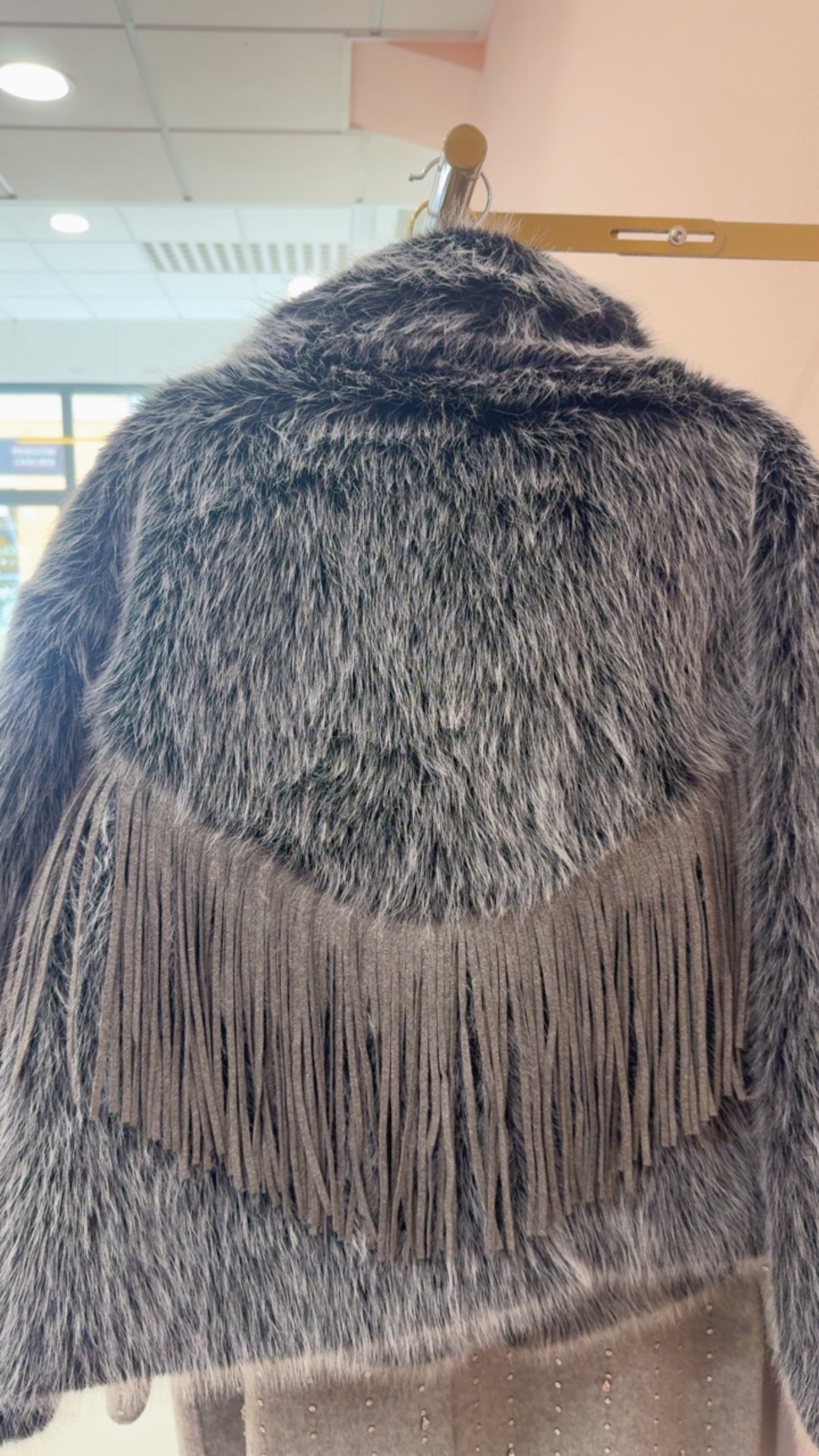 Pelliccia eco frange