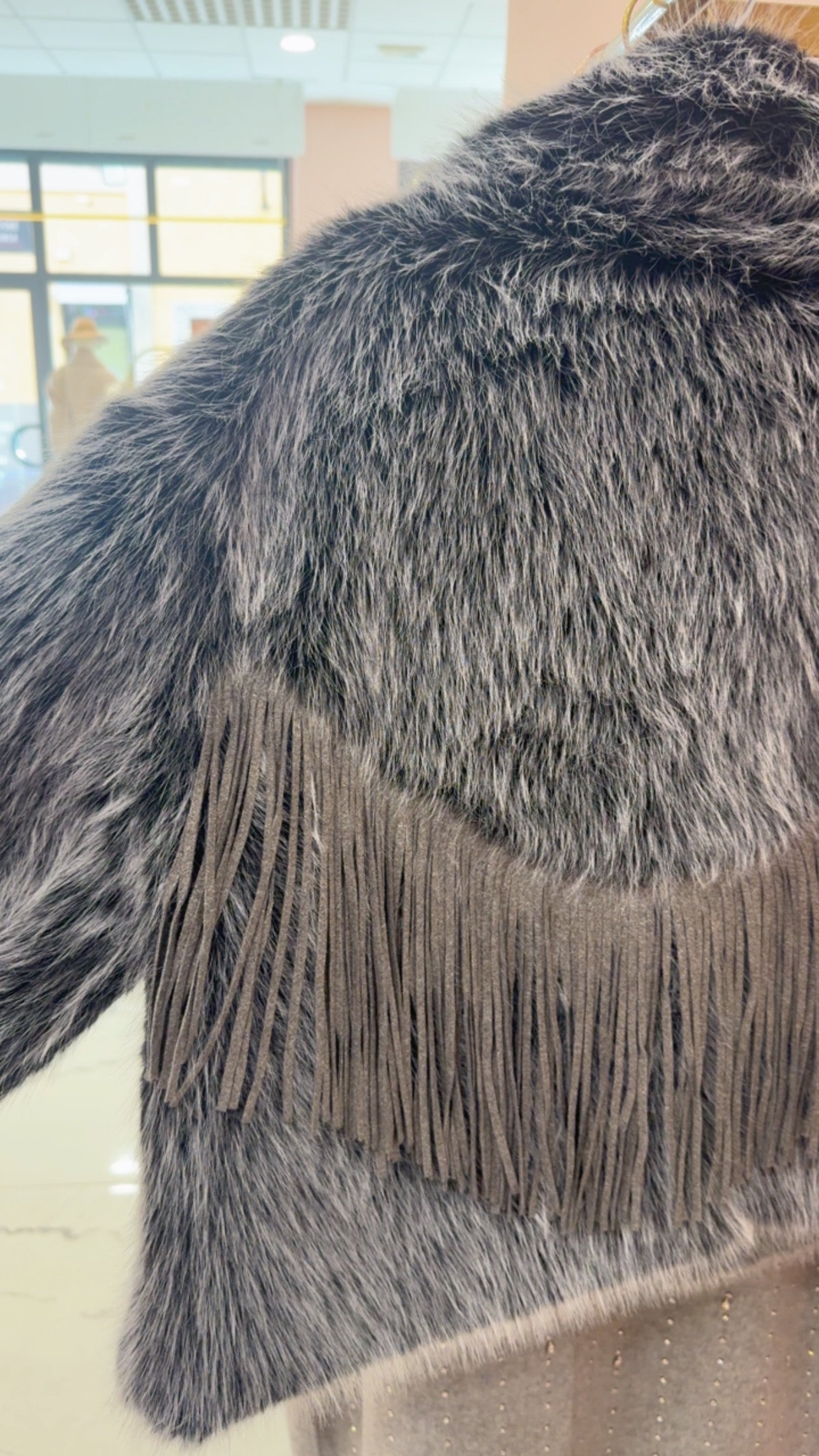 Pelliccia eco frange